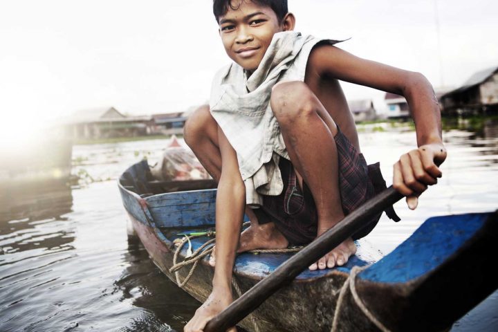 Green Cultural Travel - Cambodia - Siem Reap - Floating Village - Boy on a boat